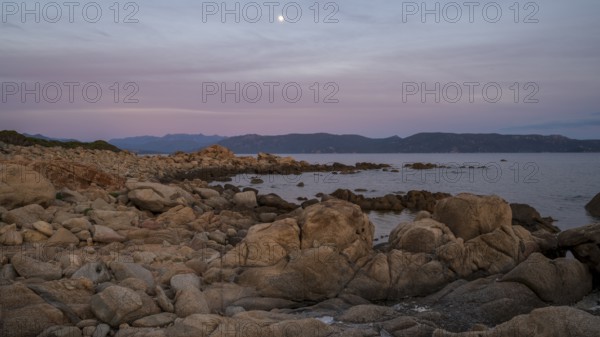 Sunset, rocky coast near Porto Pollo, Corsica, France