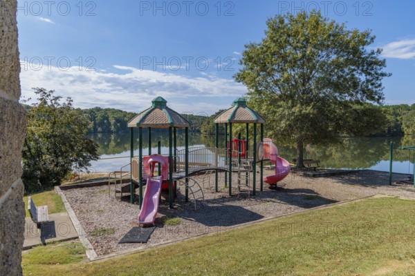 Playground and swimming area in the Pin Oak Campground at Natchez Trace State Park near