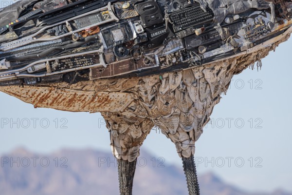 Close up of Recycled Roadrunner statue made entirely from discarded materials by artist Olin Calk