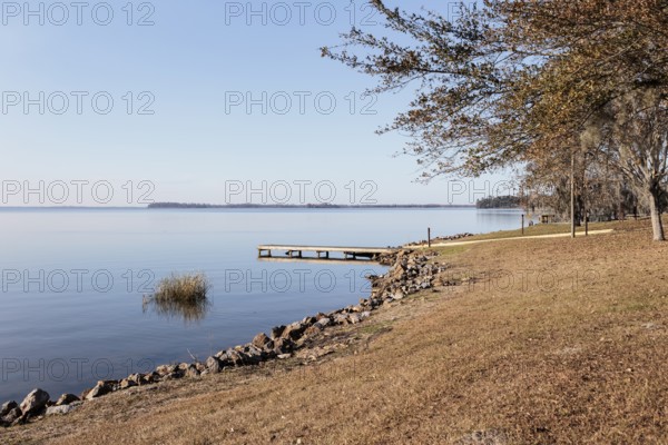 Small wooden dock and boat ramp on Lake Seminole at the Corps of Engineers Eastbank Campground near