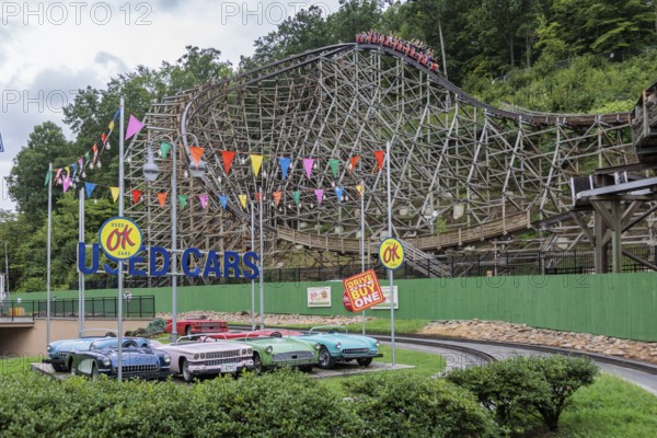 Lightning Rod roller coaster behind replica cars of the Rockin' Roadway ride at the Dollywood