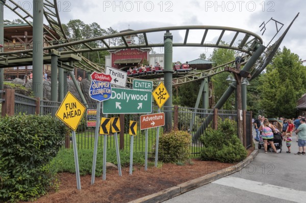 Road sign display for the Summer Celebrationin front of the FireChaser roller coaster ride in the
