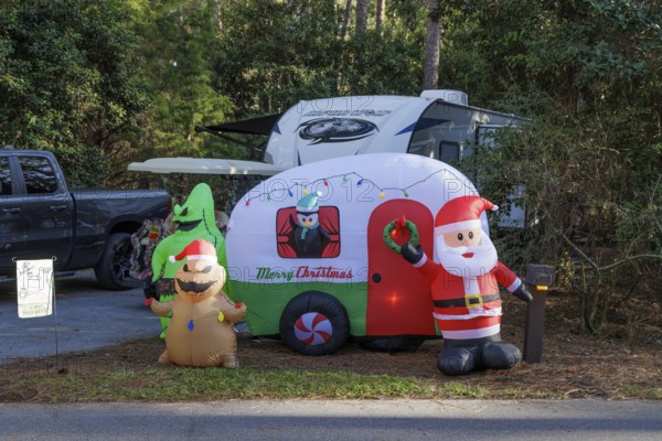 Inflatable Christmas and Halloween decorations at a campsite in Fort Wilderness campground at Walt