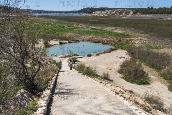 People take a bath, natural hot springs Banos de Zujar, near artificial lake Embalse de Negratin,