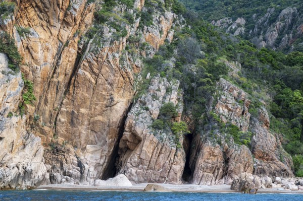 Rock formations and deep blue water, Capo Rosso, Gulf of Porto, Corsica, France