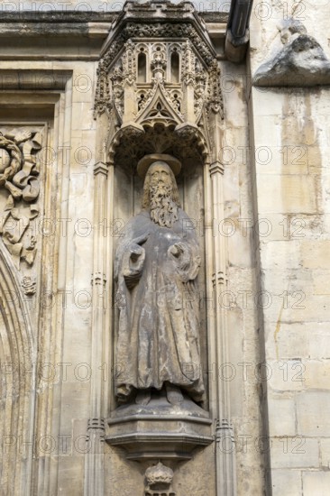 Carved stonework statue of Saint Paul, front of Abbey church, city of Bath, north east Somerset,
