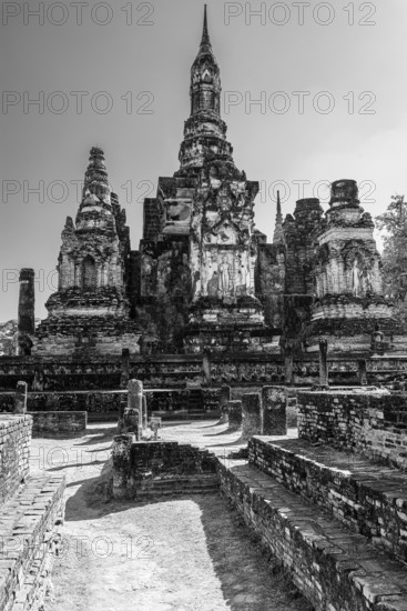 Historic Buddhist temple complex Wat Mahathat, historical park, black and white photo, Sukhothai,