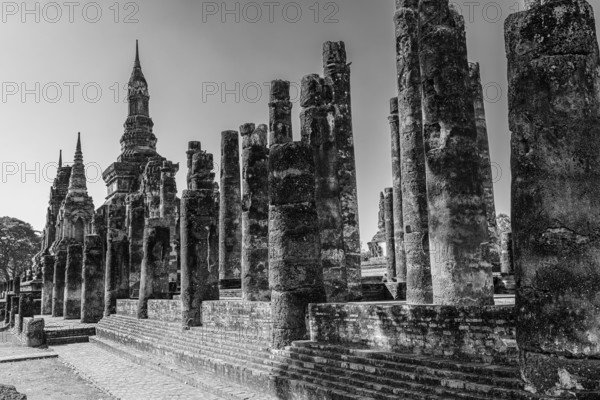 Historic Buddhist temple complex Wat Mahathat, historical park, black and white photo, Sukhothai,