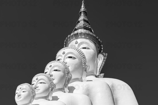 Five-headed Buddha statue, black and white photo, Wat Phra That Sorn Kaew Buddhist temple complex,