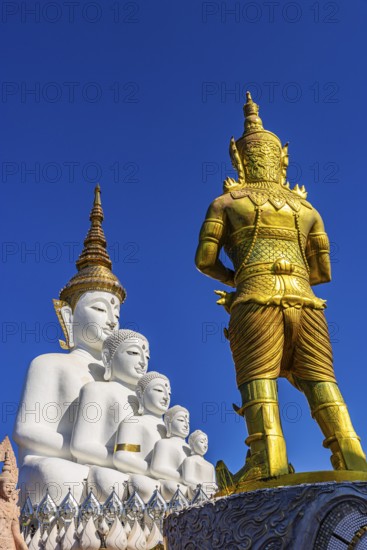 Five-headed Buddha statue with a gilded temple guard in front of it, Wat Phra That Sorn Kaew