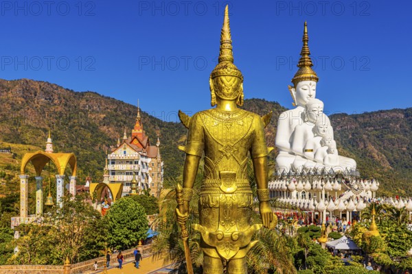 Wat Phra That Sorn Kaew Buddhist temple complex with five-headed Buddha statue, bell tower and