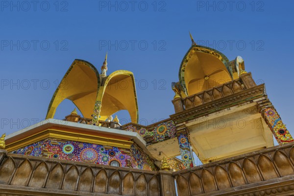 Round arch pavilions decorated with colorful mosaics and glass works of art, Buddhist temple