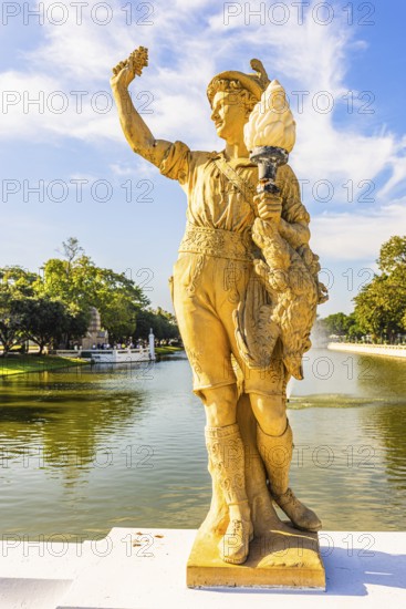 Stone male figure in alpine traditional costume, Thai King's summer palace, Bang Pa-In, near