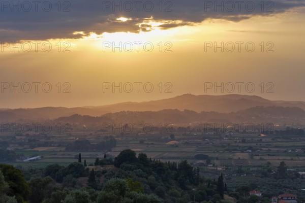 Impressive evening mood with sweeping views over fields and hills in the distance, Hotel Europa,
