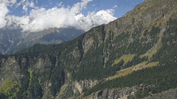 Dramatic landscape with high mountains on the Manali-Leh Highway and passing clouds, trekking