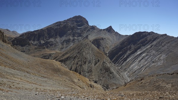 Rocky mountain landscape under a bright blue sky, trekking in Ladakh, Himalayas, India