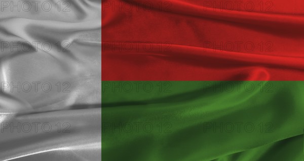 Flag of Madagascar with fabric textured background. Close up of National flag of Madagascar with
