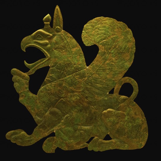 Monumental bronze sheet, griffin suckling her cub, golden sculpture of a griffin with wings, a
