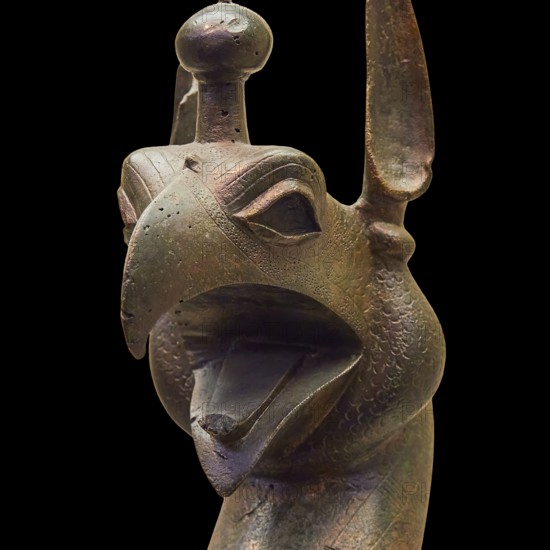 Bronze griffin protome, bronze sculptural depiction of a mythical being with stylized head, Olympia