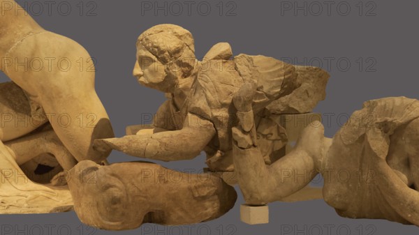 Crouching lapithin, west pediment of the Temple of Zeus, centauromachy, group of ancient stone