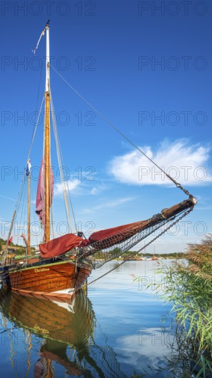 Traditional wooden sailboat in the harbor on the ferry of Moritzdorf, OT of Sellin, Mönchgut