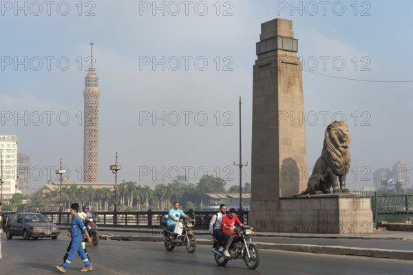 Cairo, Egypt. July 1st 2024 A view of Qasr El Nil Bridge and Cairo Tower with early morning traffic