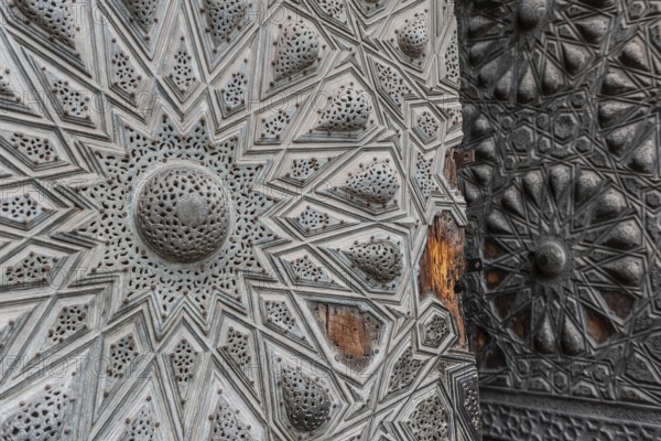 Beautiful Islamic geometric designed ancient wooden door of historical monument in the Egyptian