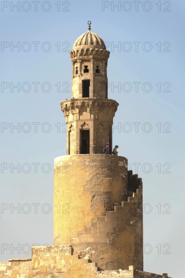 Cairo, Egypt. November 29th 2022 Tourists climb the Spiral Tulunid Dynasty Minaret of Ibn Tulin
