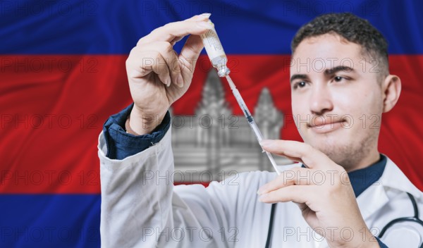 Doctor holding syringe on Cambodia flag background. Medical professional holding syringe with