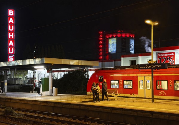 Local train at Oberbamen station with gas boiler at night, Wuppertal, North-Rhine Westphalia,
