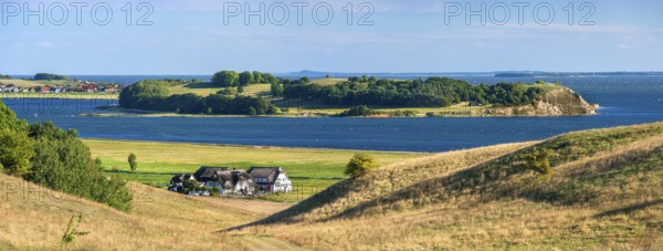 Hilly landscape in the Zicker Mountains, including Zicker Alps, view across the lagoon landscape to