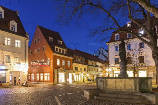 Atmospheric night view of Heinrichsplatz with Heinrichsbrunnen, Meissen, Saxony, Germany