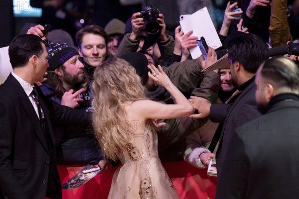 Amanda Seyfried with fans on the Red Carpet at the premiere of the film The Testament Of Ann Lee at