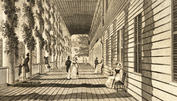 Strolling in Saratoga, USA, columns with garlands, wooden construction, festive clothing, walkers,
