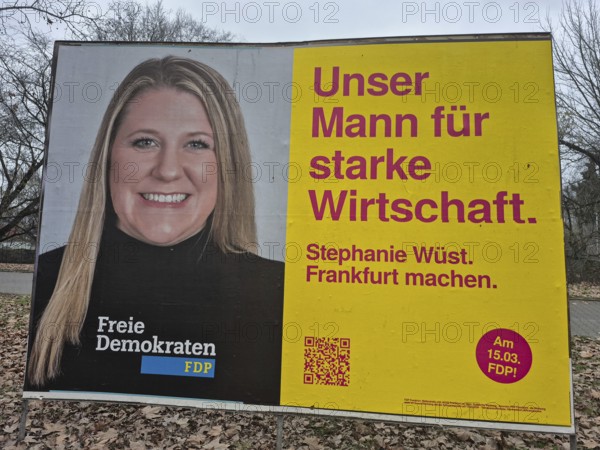 An election poster of the top FDP candidate Stephanie Wüst in Frankfurt am Main advertises with the