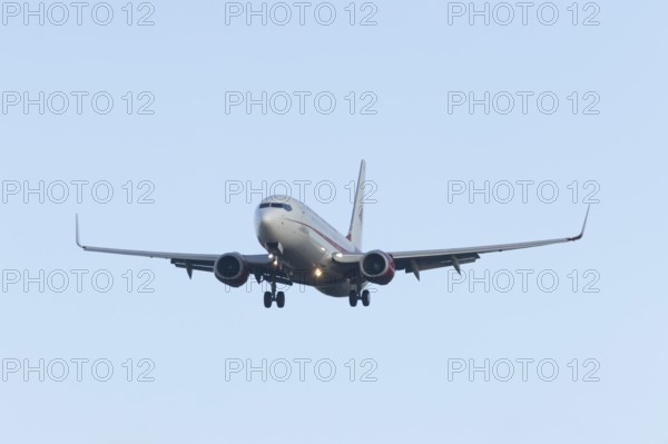 Boeing 737 commercial passenger airliner jet aircraft in flight on approach to land at London
