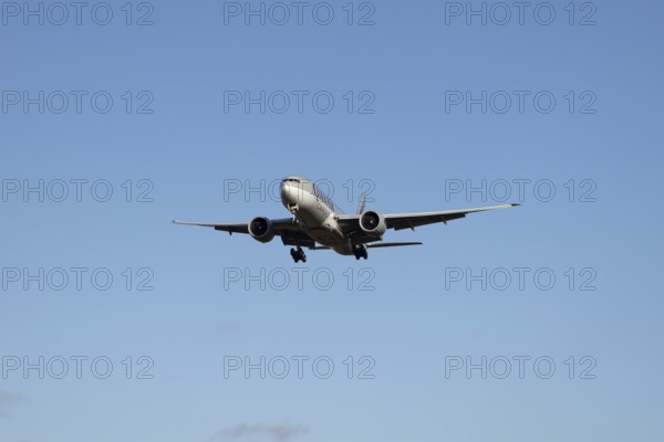 Boeing 777 commercial jet aircraft of Qatar cargo in flight on approach to London Stansted airport,
