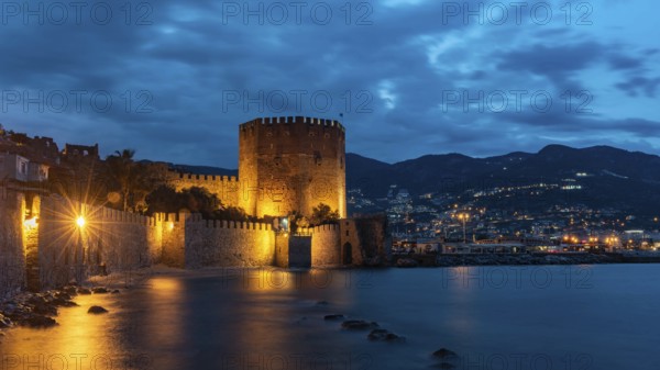 Alanya, Turkey, April 9th 2021 Stunning panorama of Alanya Harbour and the Red Tower at night with