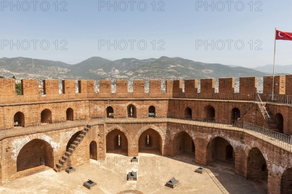Alanya, Turkey. April 7th 2021 The imposing battlements of the Seljuk era Red Tower or Kizi Kule