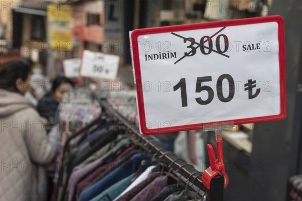 Istanbul, Turkey 7th January 2025. Local Turkish shoppers browsing clothes reduced in price in a