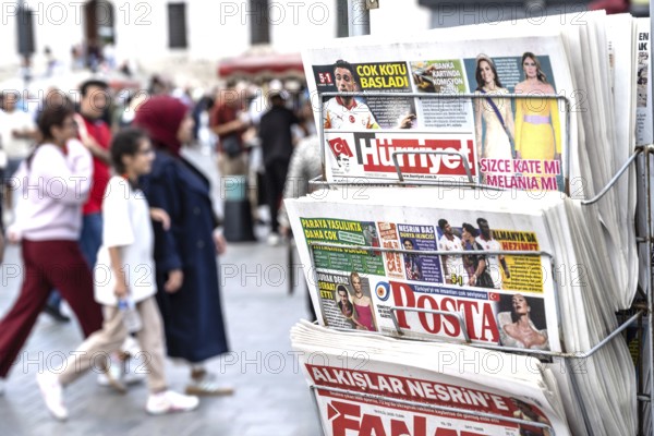 Istanbul, Turkey. September 18th 2025. Popular Turkish newspapers for sale outside a shop in a busy