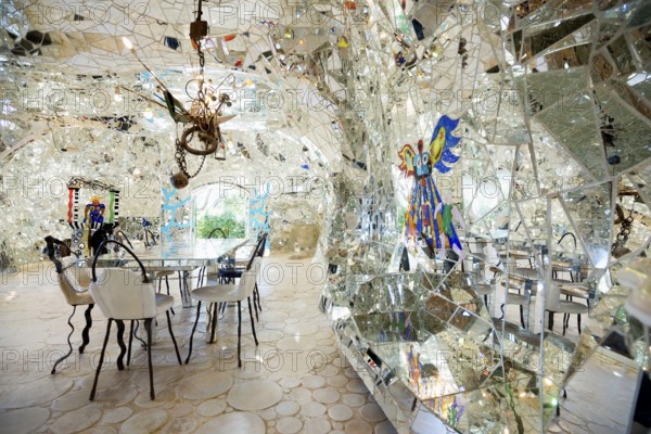 Living room made of glass and mirrors, Giardino dei Tarocchi, Tarot Garden, by Niki de Saint