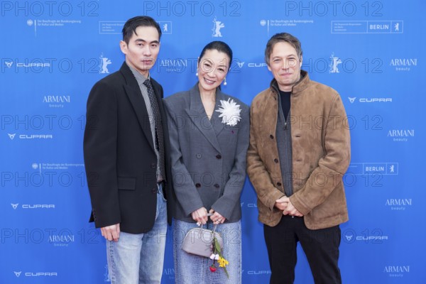 Hang Chong, Michelle Yeoh and Sean Baker in front of the premiere of the film Everything Everywhere