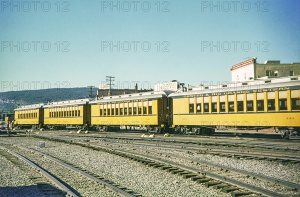 Passenger railway carriages of the Denver and Rio Grande Western Narrow Gauge Railroad, at depot