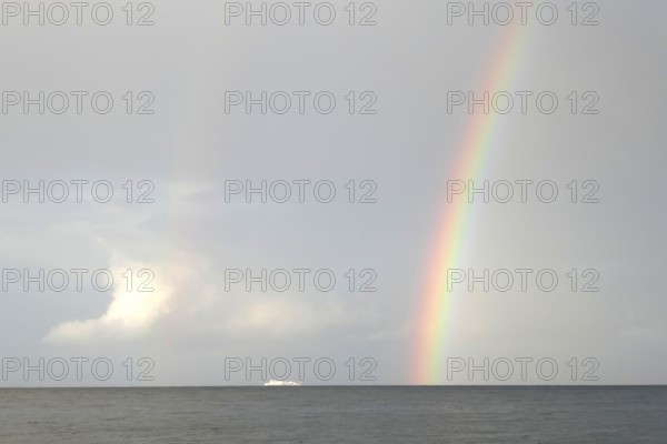 Unity Line ferry, rainbow, Rügen island, largest and most populous German island. Baltic Sea coast,