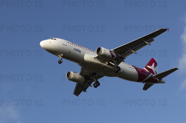 Airbus A320 commercial passenger airliner jet aircraft of Electra airlines flying on approach to