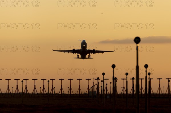 Boeing 737 commercial passenger airliner jet aircraft of Ryanair airlines in flight taking off at