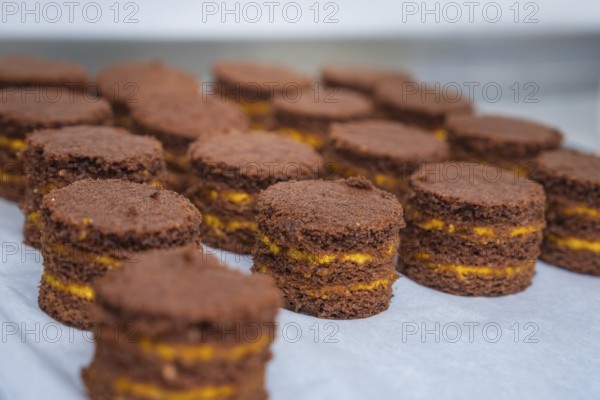 Chocolate chip cookies with filling on a tray, vegan cake production, Haselstaller Hof, Gechingen,