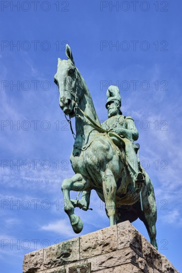 Emperor Frederick III, equestrian statue, sandstone pedestal, blue sky, cirrus clouds, Hohenzollern