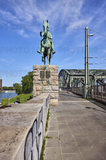 Equestrian statue of Emperor Frederick III, sandstone wall, Hohenzollern bridge, arched bridge,